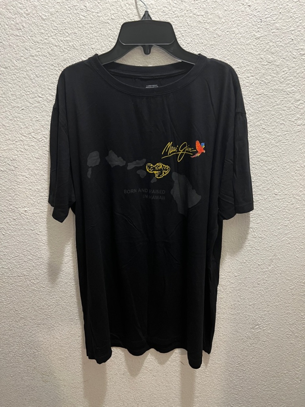 Maui Jim Black Short Sleeve Tee with Yellow Script and Multicolor Parrot